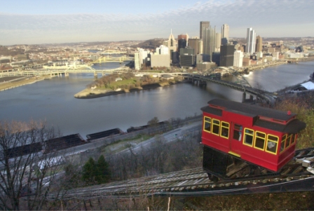 The city of Pittsburgh as seen from Mount Washington, an incline car in the foreground.